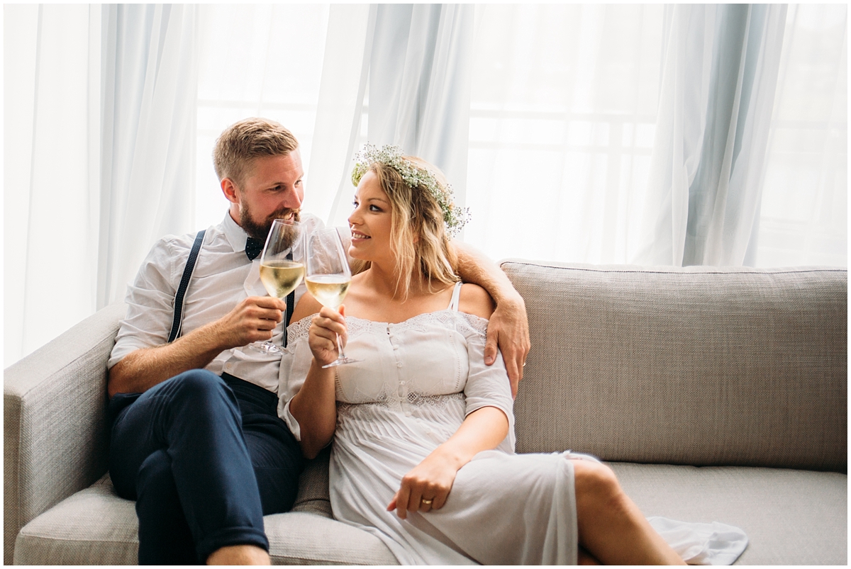 Couple cheers their wine glasses