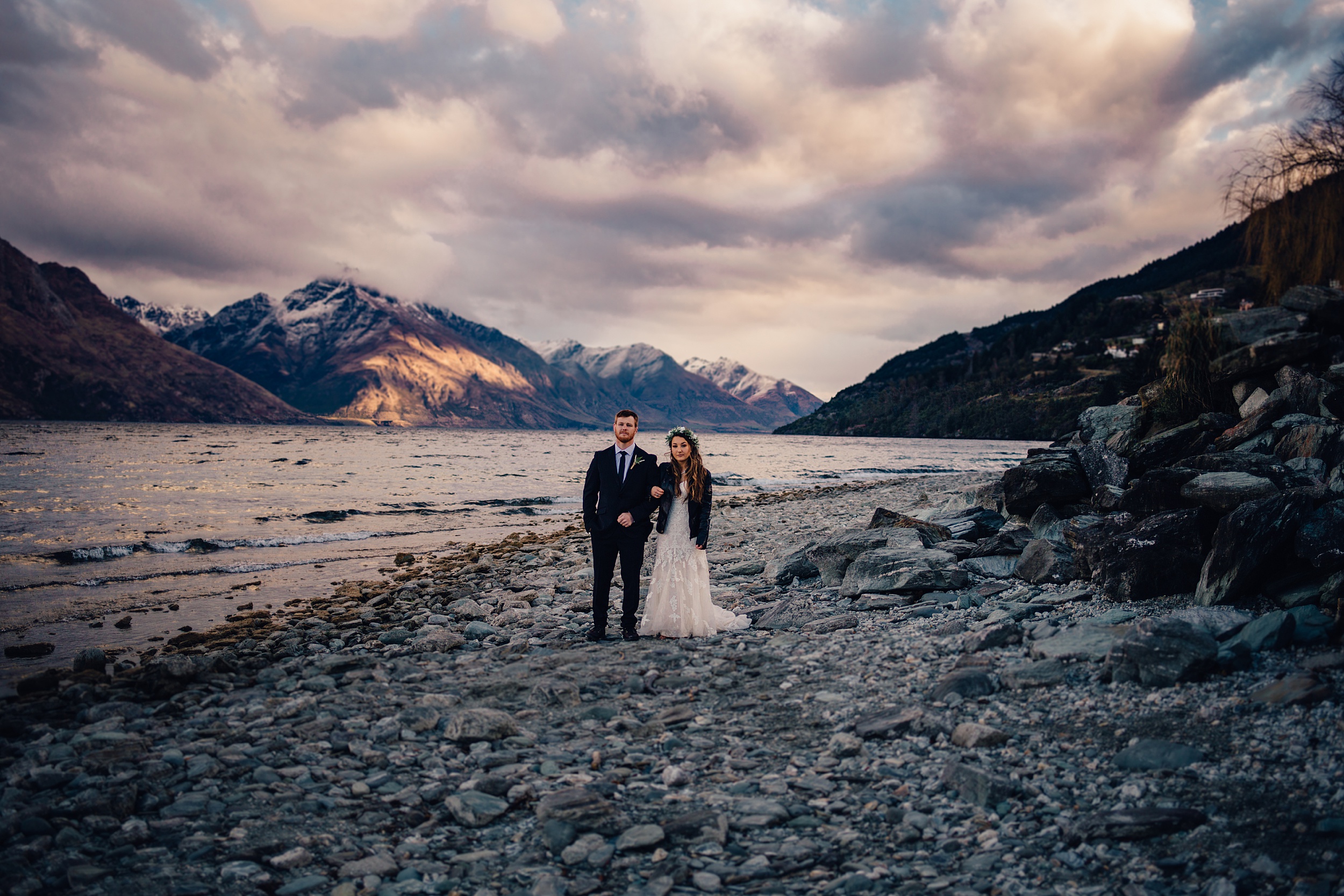 Bride and groom on the edge of Lake Wakatipu